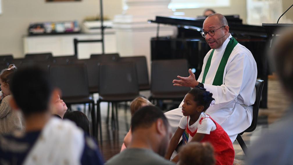 Fr. Phil Jackson gives a lesson during the 9:15am family service at St. Paul's Chapel