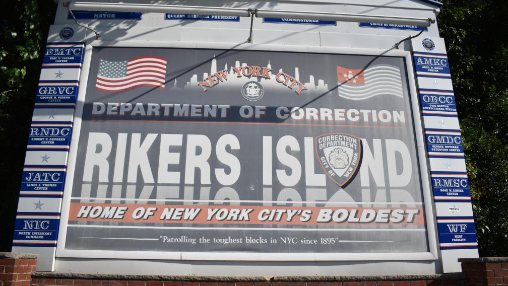 Rikers Island sign at entrance to Rikers Island Jail Complex