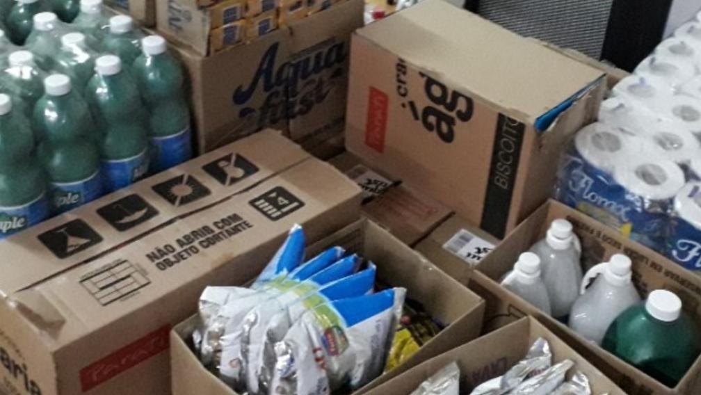 Boxes of bottled water and other necessities
