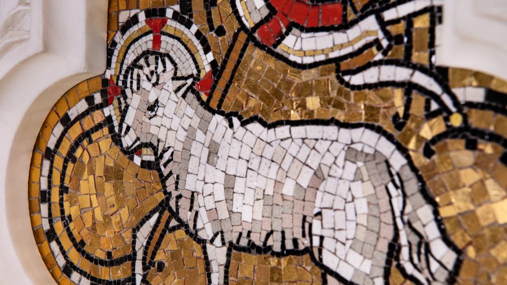A mosaic depiction of a lamb on the altar in Trinity Church