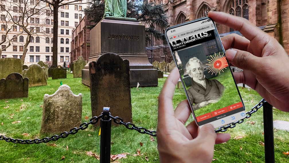 Hands holding a phone with the AR app showing in the Trinity Churchyard