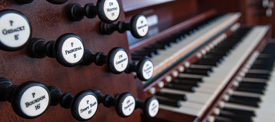 A close-up view of the stops and keys on the St. Paul's Chapel Noack organ