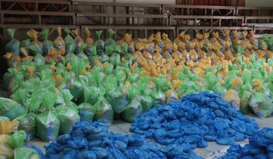 Blue, green, and yellow plastic bags
