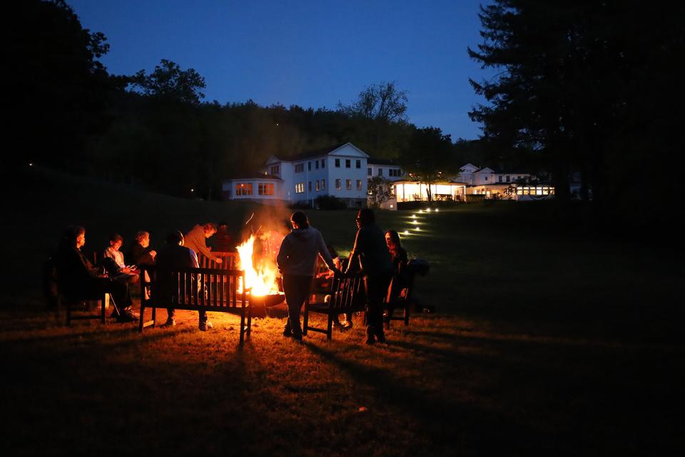 Group at bonfire at Trinity Retreat Center