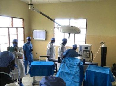 Surgical staff conduct a procedure in the expanded Birimba Medical Clinic..