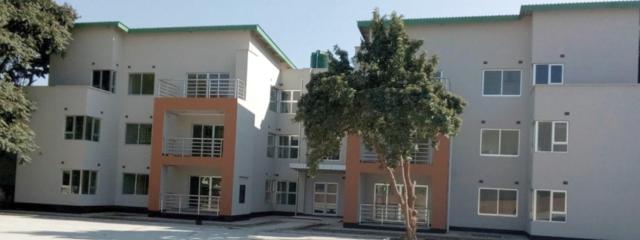 An exterior shot of the Selby Taylor Apartment Complex in Lusaka. Anglican