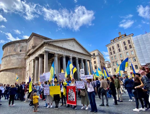 Demonstrators stand in front of Rome's Pantheon
