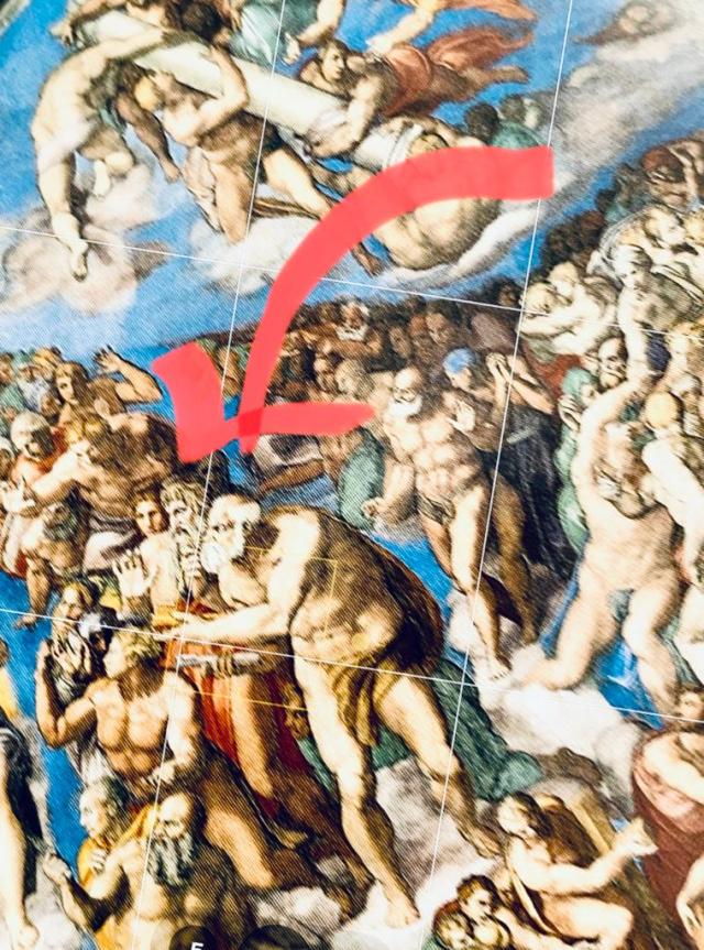 Detail of a painting with an arrow pointing to St. Paul
