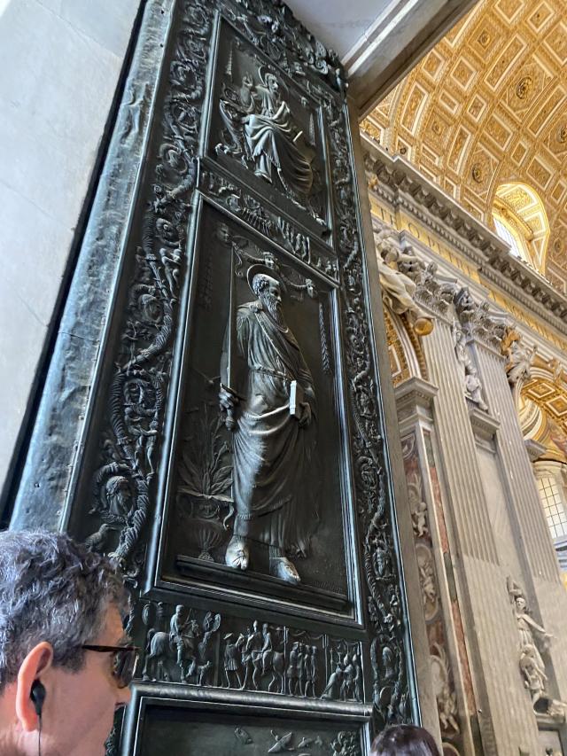 Very tall doors with detailed carving