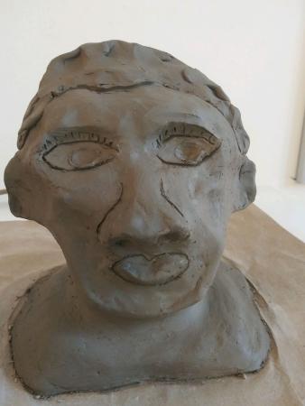 A clay sculpture bust