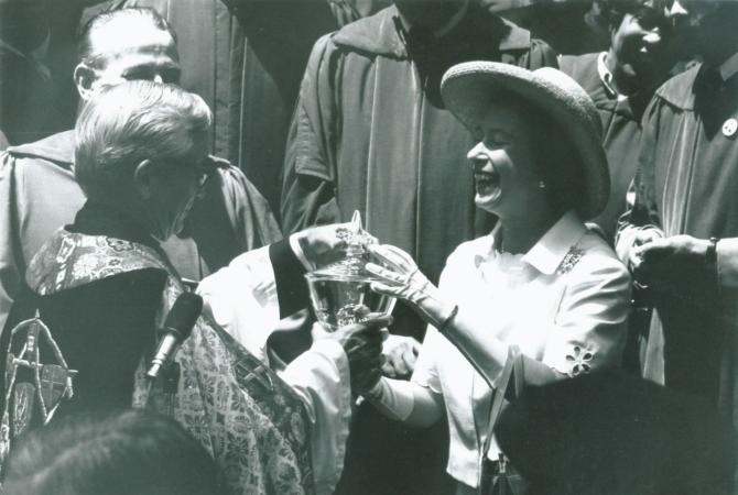 Queen Elizabeth II receiving a back rent of 279 peppercorns from Rev. Dr. Parks, 1976