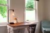 Guest room writing desk with view of the grounds