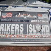 Rikers Island sign at entrance to Rikers Island Jail Complex