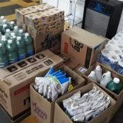 Boxes of bottled water and other necessities