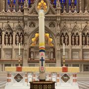 The Paschal Candle at altar of Trinity Church Wall Street