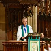 Father Callaway in the pulpit