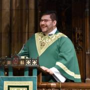 Father Matt in the pulpit