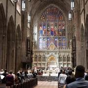 In person worship with social distancing in Trinity Church