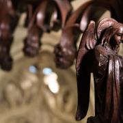 A wooden carving of an angel in the Chapel of All Saints at Trinity Church Wall Street