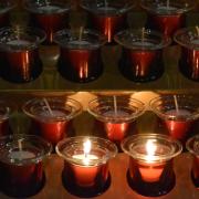 Burning prayer candles in the Chapel of All Saints at Trinity Church