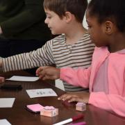 Children make handmade Valentine cards in St. Paul's Chapel during Whole Community Learning in early 2020