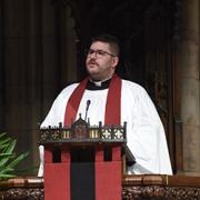 The Rev. Matt Welsch preaches in Trinity Church