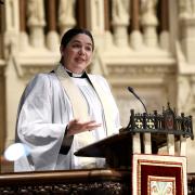 The Rev. Beth Blunt preaches at the pulpit at Trinity Church on June 4, 2023.