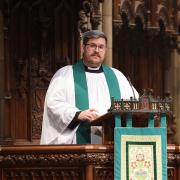 The Rev. Matt Welsch preaches in Trinity Church