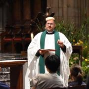 The Rev. Matt Welsch preaches in Trinity Church.