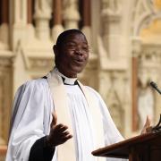 The Rev. Alfred Loua preaches on Transfiguration Sunday in Trinity Church.
