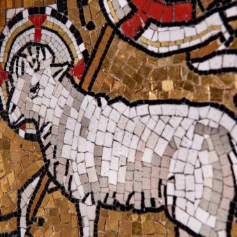 A mosaic depiction of a lamb on the altar in Trinity Church