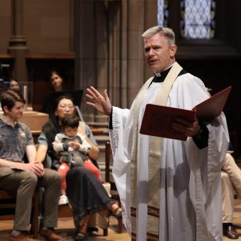 The Rev. Michael A. Bird preaches to families at the 9am service in Trinity Church.