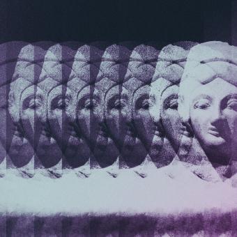 Purple image of a statue repeated