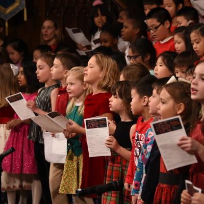Youth choristers sing during a holiday concert.