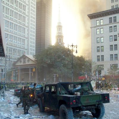 Jeeps and soldiers standing on Broadway in front of St. Paul's Chapel on September 11, 2001