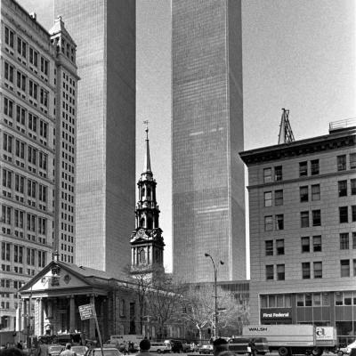 Black and White photo of St. Paul's Chapel with the World Trade Center towers