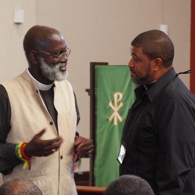 Father Mark in conversation with an attendee of the 2019 LAC (Latin America and the Caribbean) Retreat in October 2019. 