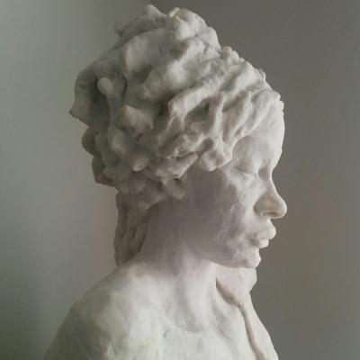 White statue of woman's head