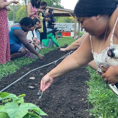 Retreatants sow seeds at the Trinity Retreat Center farm