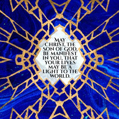 blue stained glass with blessing written in a burst of light