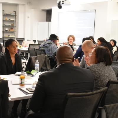 Racial Justice initiative staff and grantees speak in small groups during the November 2019 Racial Justice Grantee Convening.