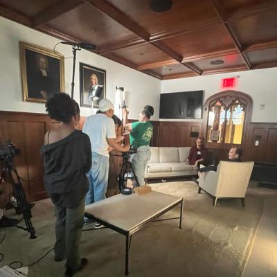 Students adjust cameras in Vestry room to prepare for an interview